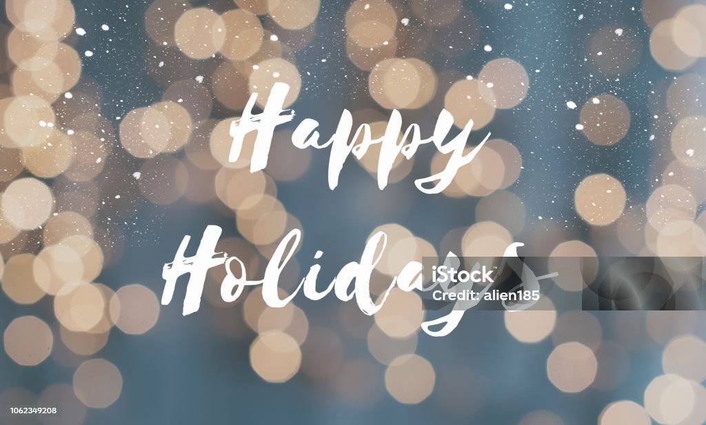 Greeting card happy holidays with defocused christmas lights Greeting card happy holidays with defocused christmas lights as background Happy Holidays - Short Phrase Stock Photo