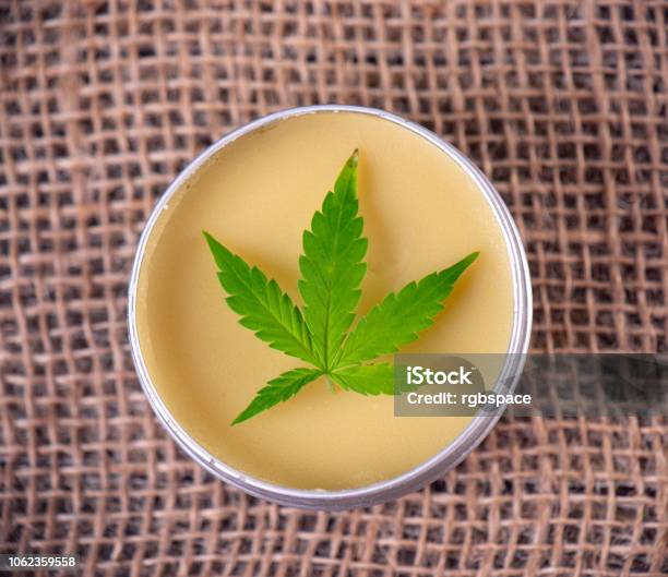 Cannabis Hemp Cream With Marijuana Leaf Cannabis Topicals Concept Stock Photo - Download Image Now