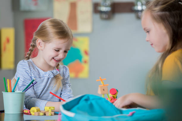istock Cute kindergarteners using STEM educational toys during in classroom 1062370538