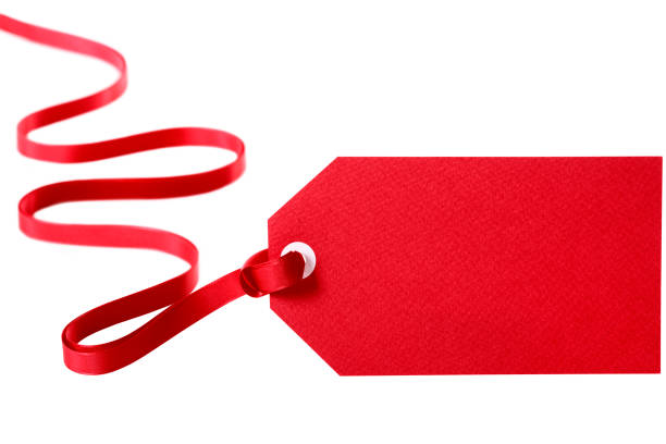 istock Gift tag red ribbon isolated 1062378738