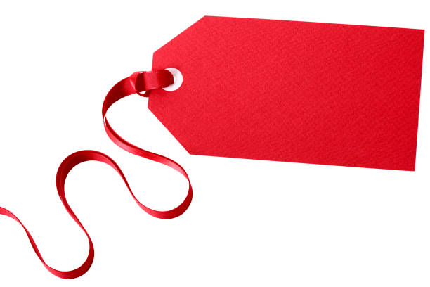 istock Red gift tag with ribbon isolated on white 1062378804