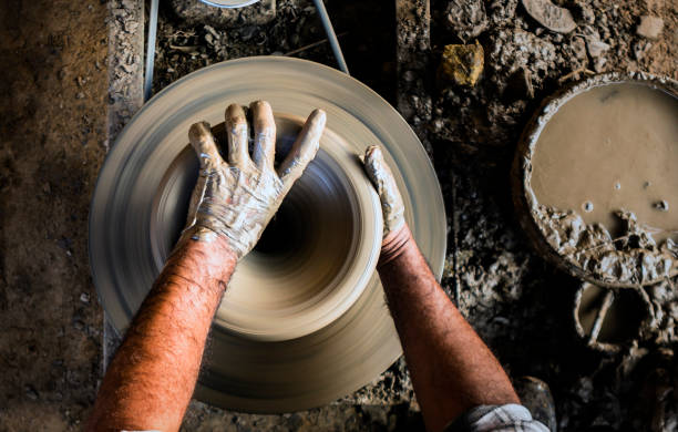 istock hands of a potter 1062382436