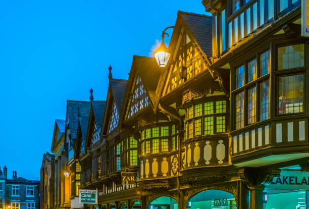 sunset view of traditional tudor houses alongside the northgate street in the central chester, england - mansion tudor style non urban scene residential structure imagens e fotografias de stock