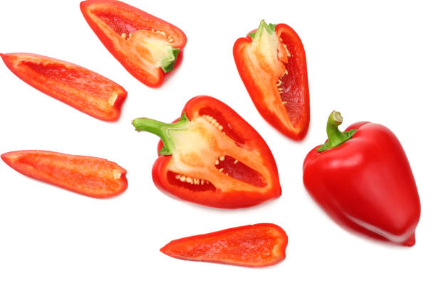 istock sliced red sweet bell pepper isolated on white background. top view 1062410770