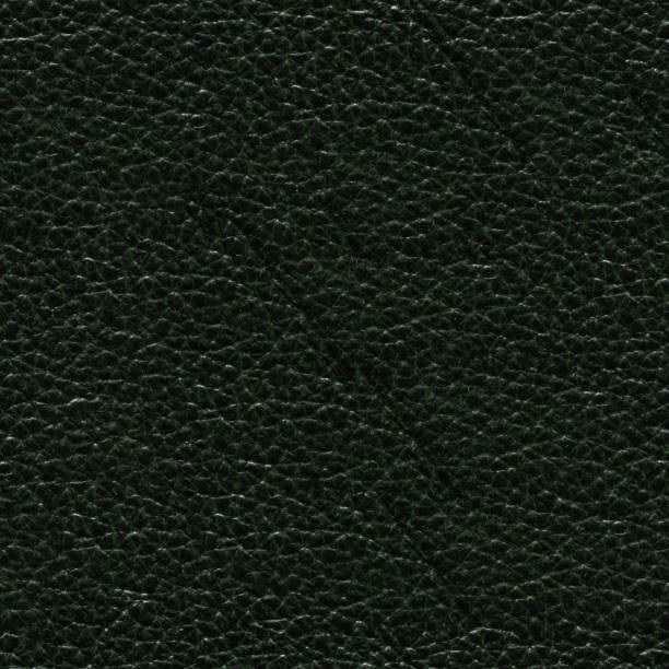 istock Saturated green leather background. Elegant dark green leather texture. 1062417372