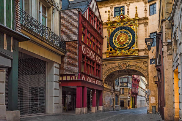 Rue du Gros Horloge or Great-clock street with famos Great clocks in Rouen, Normandy, France Rue du Gros Horloge or Great-clock street with famos Great clocks in Rouen, Normandy, France with nobody rue du gros horloge photos stock pictures, royalty-free photos & images