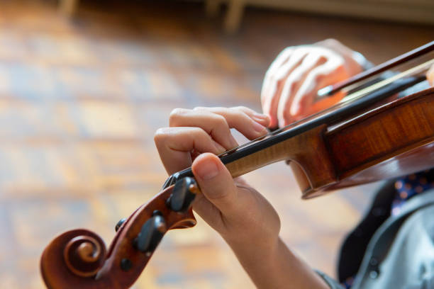 istock Hand on the strings of a violin 1062429626