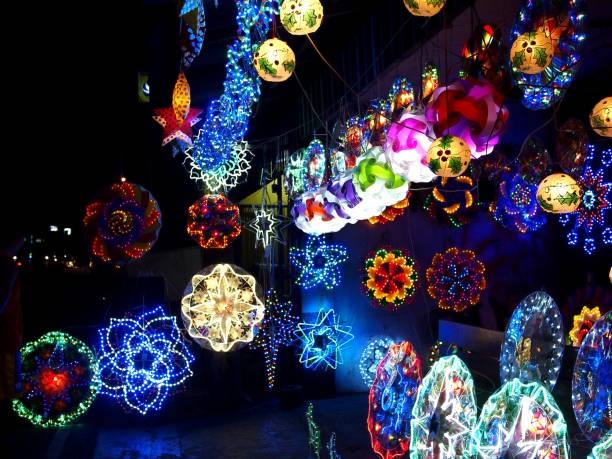 istock Colorful Christmas lanterns on display at a store 1062429736