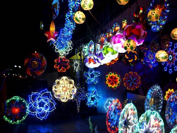 Colorful Christmas lanterns on display at a store stock photo