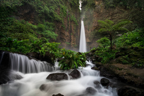 istock Long exposure of Kapas Biru waterfall in East Java 1062430196