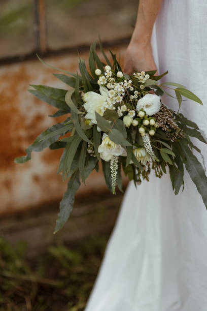 istock Bride holding a bouquet of flowers 1062430626