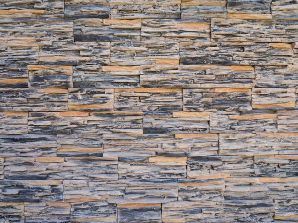 istock Decorative brown stone wall tiles. Abstract stone background. 1062433688