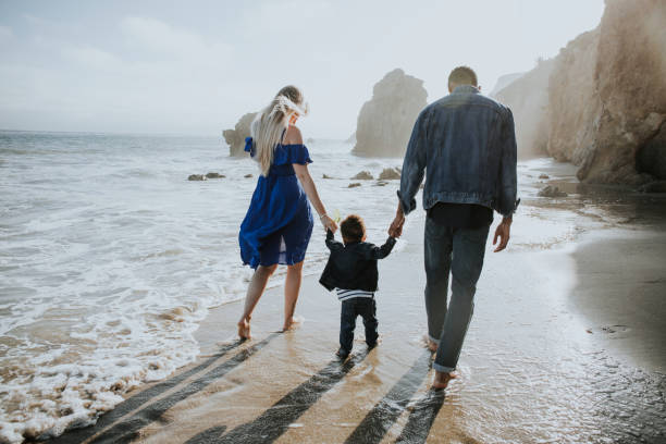 istock Happy family at a beach 1062440054