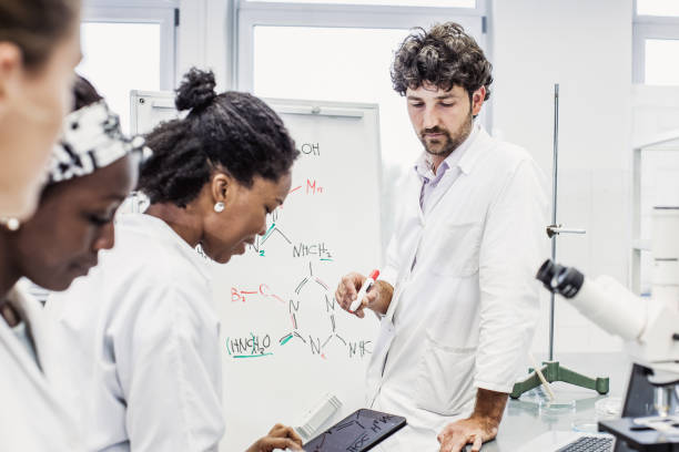 istock Scientist Having a Discussion, Meeting in The Laboratory 1062447048