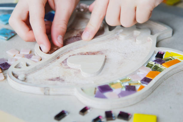 istock The process of creating a mosaic bird. 1062448894