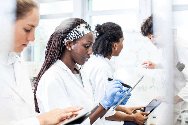 istock Scientist Having a Discussion, Meeting in The Laboratory 1062448904