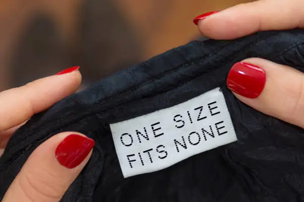 Pov woman reading one size fits none label