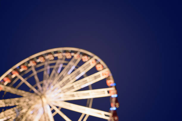 istock Ferris Wheel and Dark Night Sky 1062458762