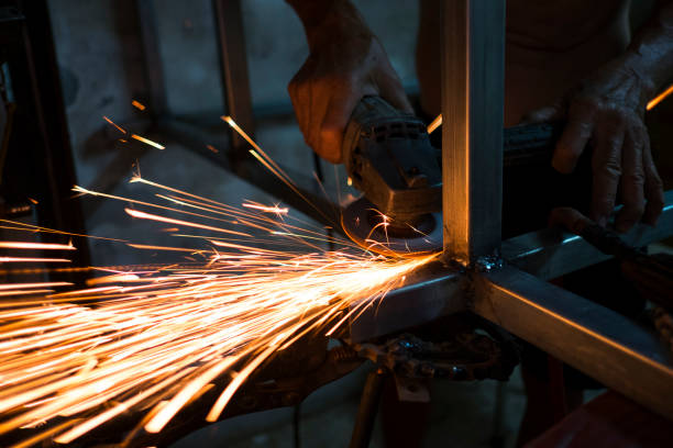 istock Worker steel welding in workspace. Sparks from welding steel. 1062464036
