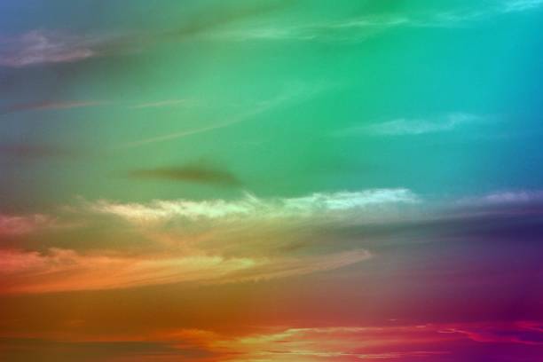 istock lovely vivid sunset or sunrise clouds on the sky for using in design as background. 1062464362