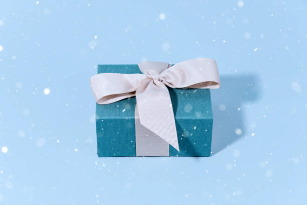 istock Blue gift boxe with Silver shiny Christmas bauble decoration. Xmas ans holiday concept. 1062471348
