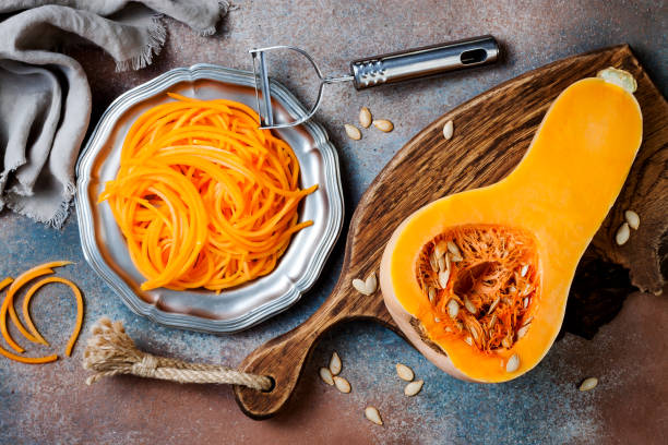 istock Spiralized butternut squash spaghetti. Low carb vegetable pasta cooking 1062480682