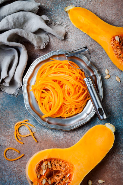 istock Spiralized butternut squash spaghetti. Low carb vegetable pasta cooking 1062480770