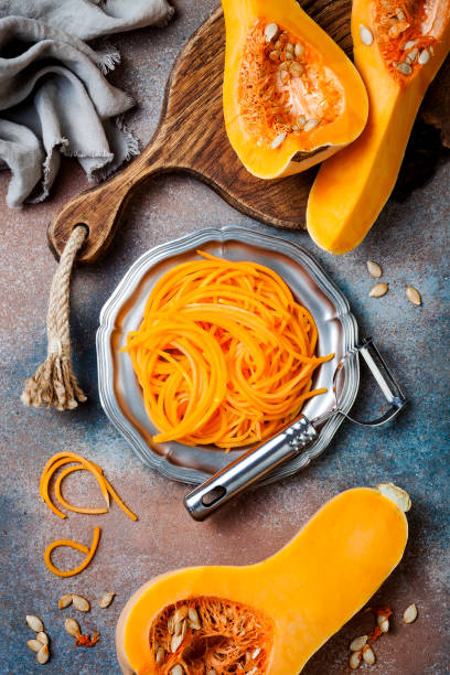 istock Spiralized butternut squash spaghetti. Low carb vegetable pasta cooking 1062480792
