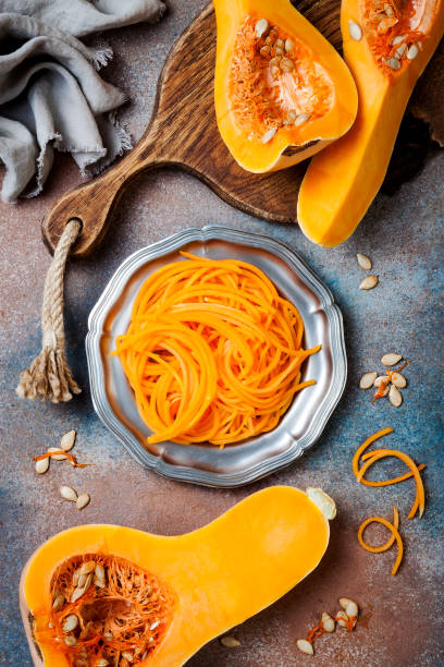 istock Spiralized butternut squash spaghetti. Low carb vegetable pasta cooking 1062480820