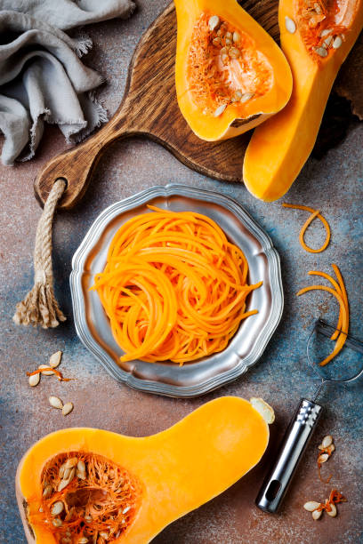 istock Spiralized butternut squash spaghetti. Low carb vegetable pasta cooking 1062480832