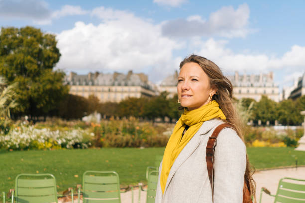 istock woman paris walking 1062483056