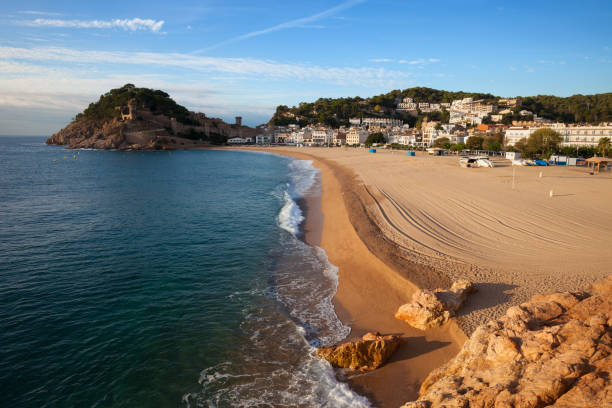 istock Beach in Tossa de Mar at Sunset 1062490196