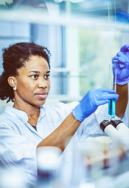 istock Female Scientist Working With Reagents 1062490754