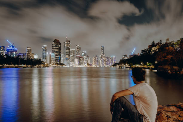 istock Human watching at skyline near water 1062504490