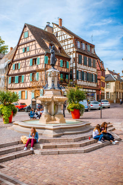 colmar old town in france - editorial built structure fountain town square imagens e fotografias de stock