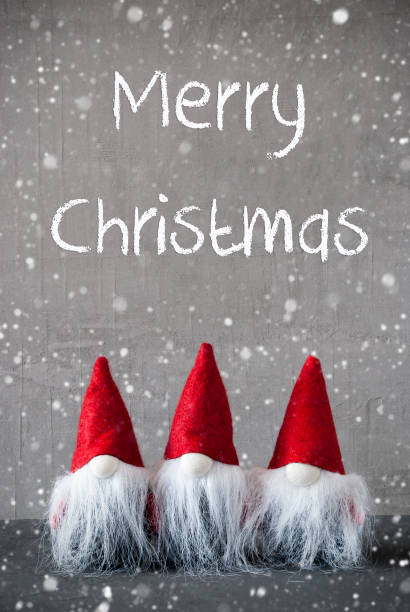 istock Three Red Gnomes, Cement, Snowflakes, Merry Christmas 1062513728
