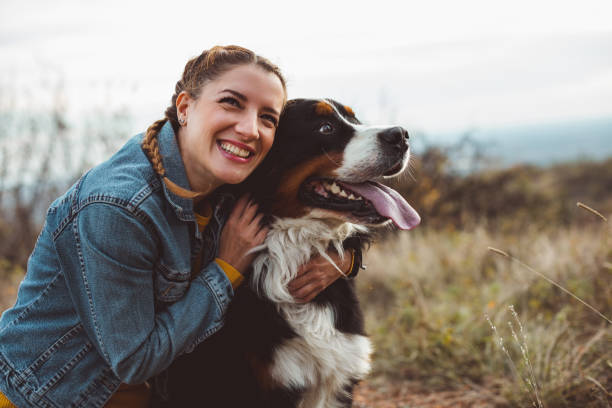istock Young woman with dog 1062514132