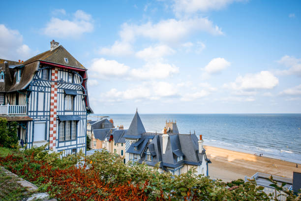 Cityscape view of Trouville in France Top view of Trouville city with luxury houses and beautiful beach on the background during the morning light in France normandy photos stock pictures, royalty-free photos & images
