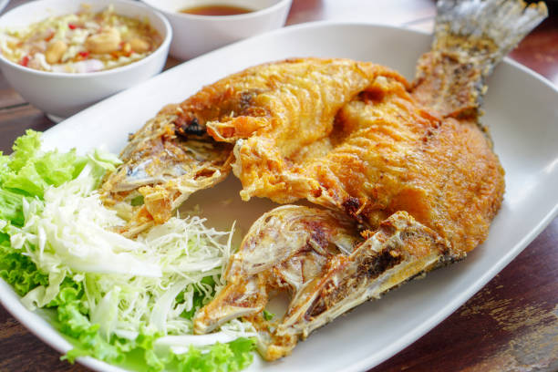istock Thai Food,Deep Fried Snappe on a white plate 1062517432