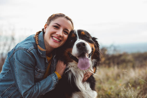 istock Young woman with dog 1062517762