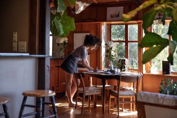 istock Young woman spending a relaxing day in her beautiful home 1062517842