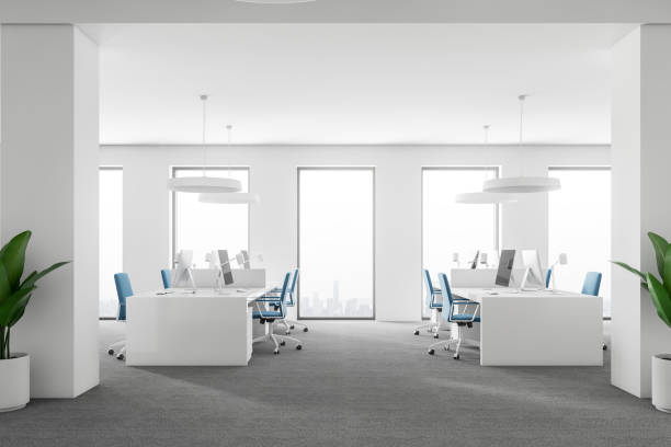istock Side view of white loft office interior 1062519524