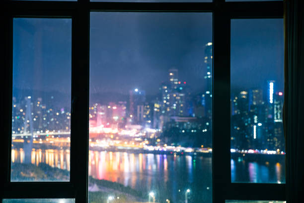 istock Glass window with city night 1062519918