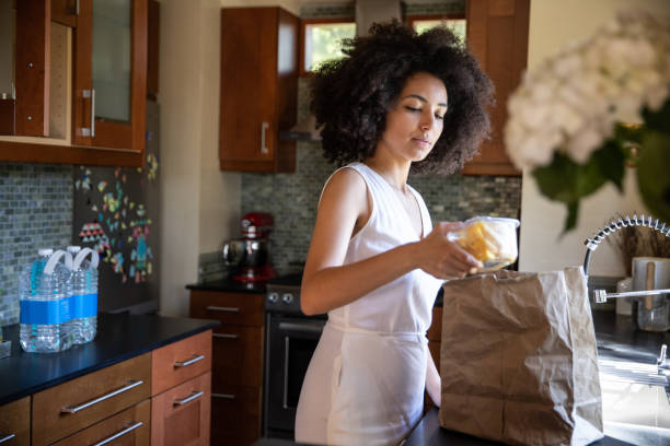 istock Young woman spending a relaxing day in her beautiful home 1062520014