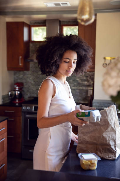 istock Young woman spending a relaxing day in her beautiful home 1062520198