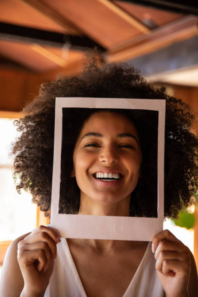 istock Young woman spending a relaxing day in her beautiful home 1062520614