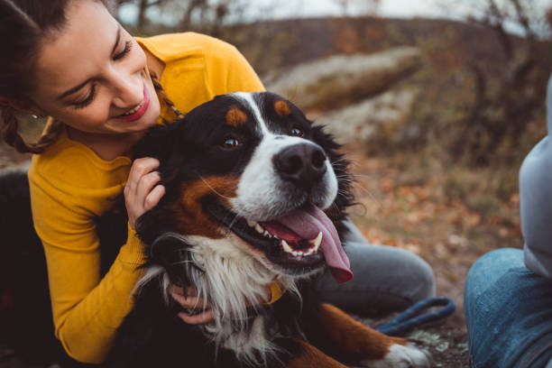 istock Young woman with dog 1062520742
