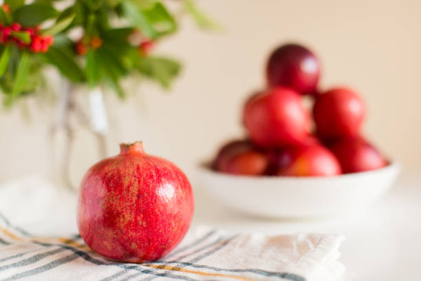 istock Red Plums and a Pomegranate 1062530386