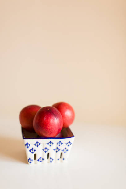 istock Red Plums in a Carton 1062530982