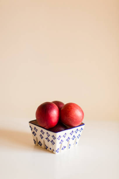 istock Red Plums in a Carton 1062531038